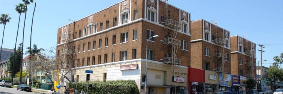 A building with a fire escape on the side of it.